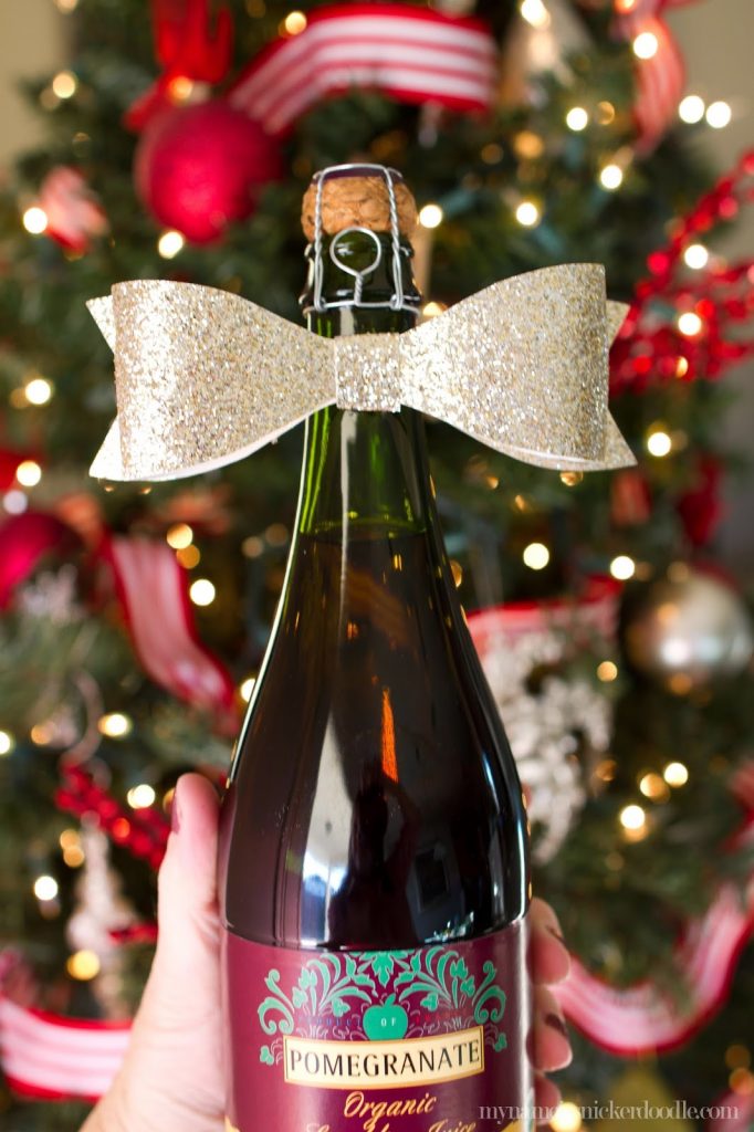 A glittered paper bow is the perfect accent to any bottle for a fun hostess gift! | My Name Is Snickerdoodle A glittered paper bow is the perfect accent to any bottle for a fun hostess gift! | My Name Is Snickerdoodle