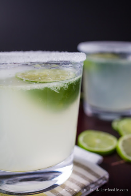 A super easy and simple homemade limeade recipe! Use a frozen half lime as an ice cube! | My Name Is Snickerdoodle
