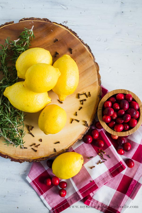 Holiday Stove Top Potpourri with lemons, rosemary, cloves and cranberries