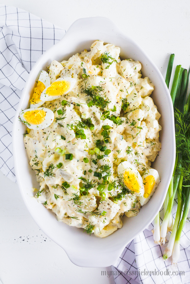 Potato Salad in a white oval bowl.