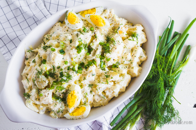 Potato Salad with eggs in a white bowl