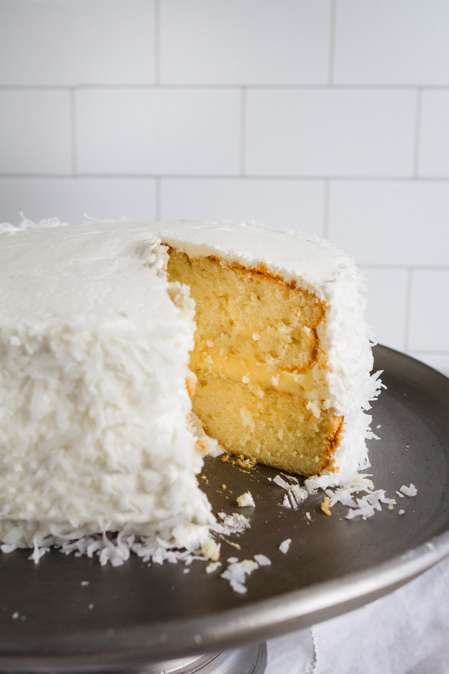 Easy coconut cake recipe using a boxed white cake mix dressed up with some special ingredients