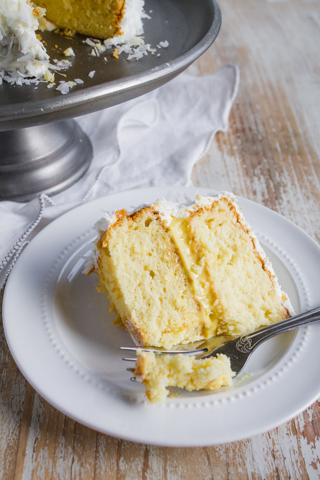 Fluffly coconut cake with coconut cream filling and shredded coconut