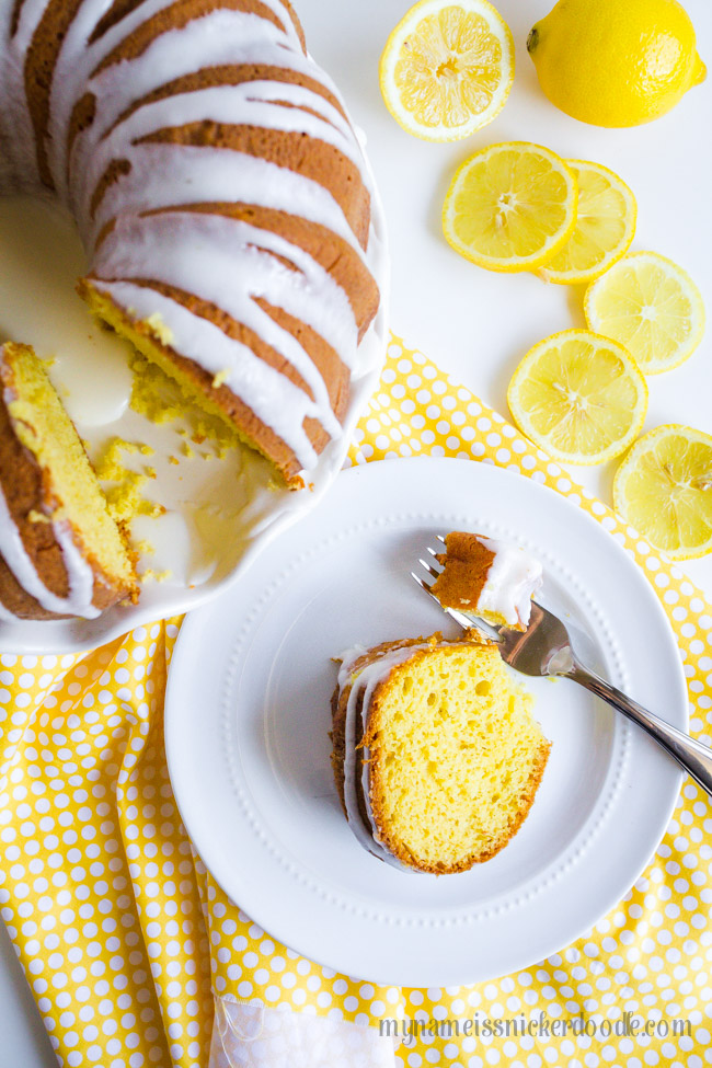 Lemon Bunt Cake On A White Cake Plate