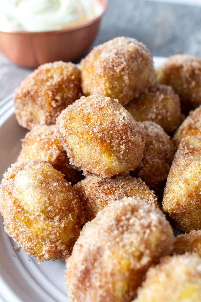 Cinnamon Sugar Pretzels Bites on a white plate.