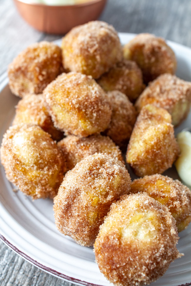 Cinnamon Sugar Soft Pretzel Bites on a white plate.