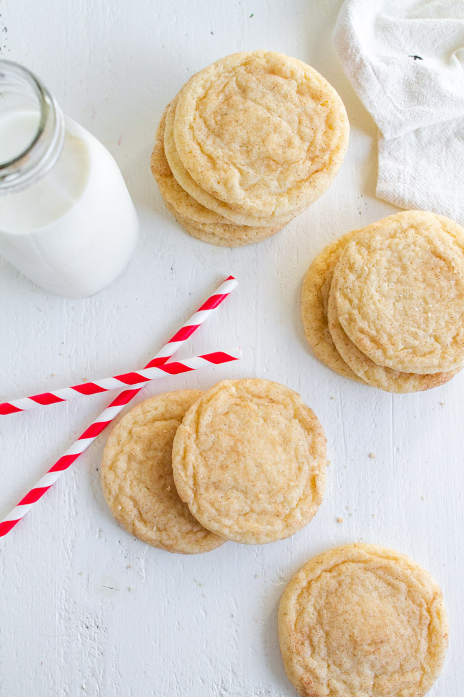 Snickerdoodles on a white table with red and white straws.