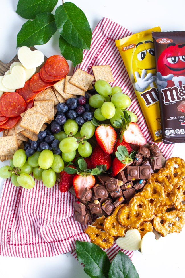 Snack board with chocolate candy and fruit