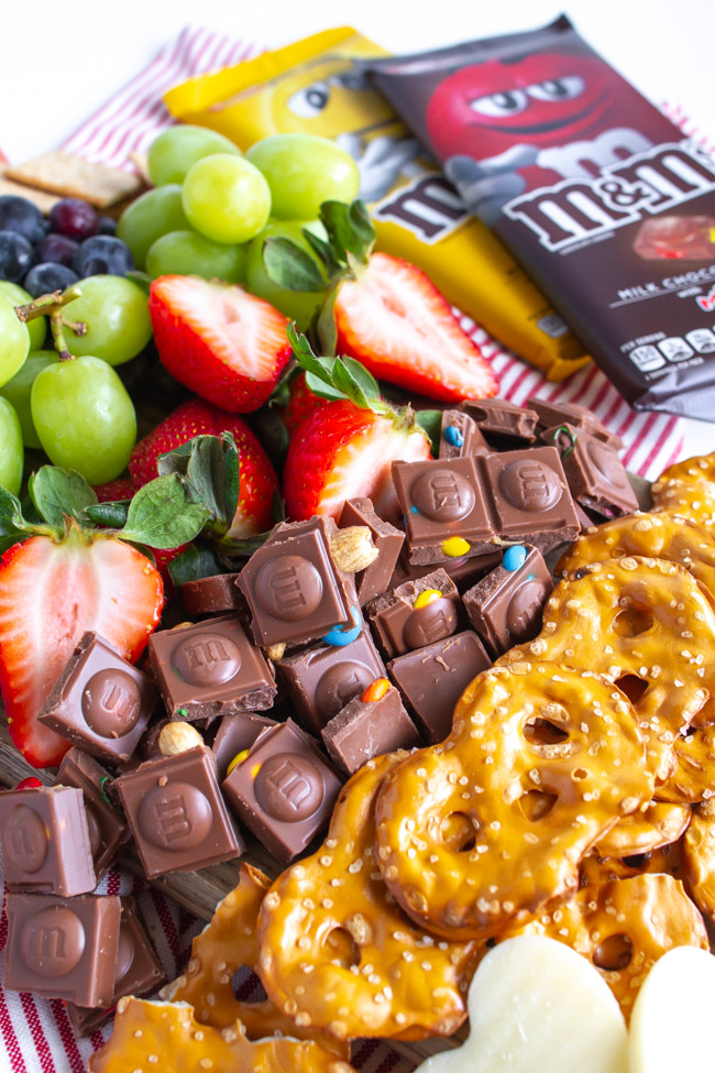 Strawberries and chocolate on a snack board