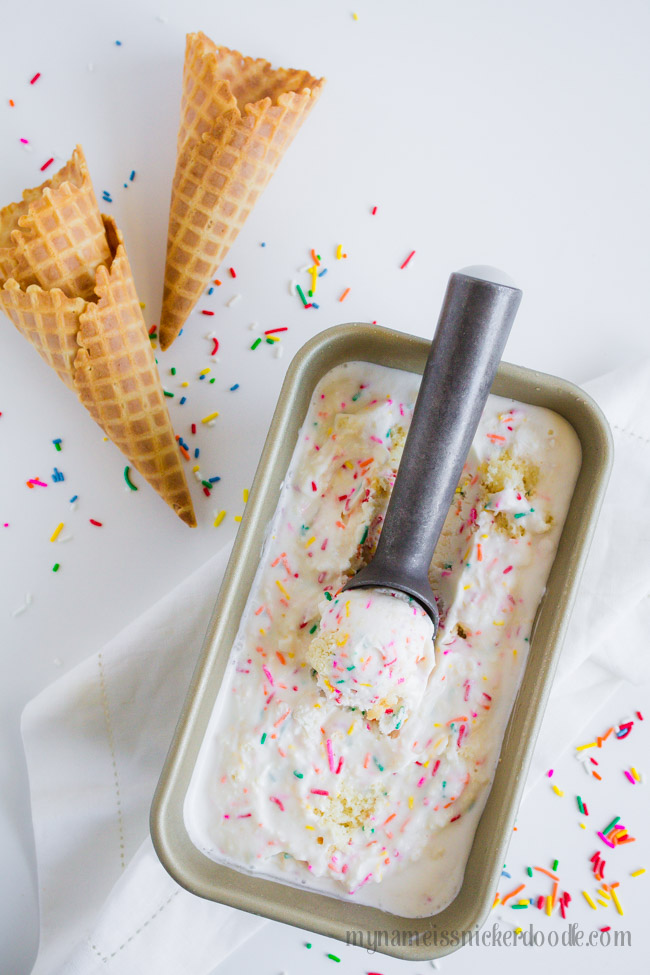 A container with sprinkle birthday cake ice cream.