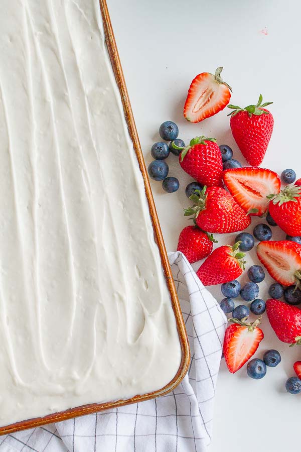 White frosting on top of a sugar cookie crust.  