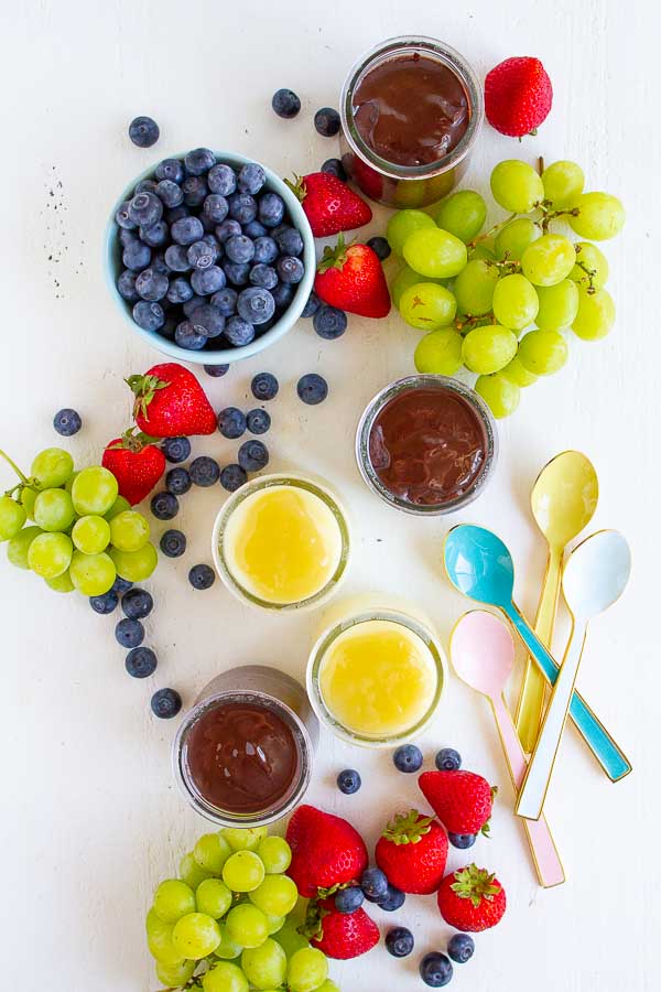 Betty Crocker Chilled Treats on a white table with strawberries and blueberries.