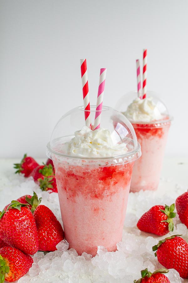 Strawberry Soda in a cup with a dome lid.