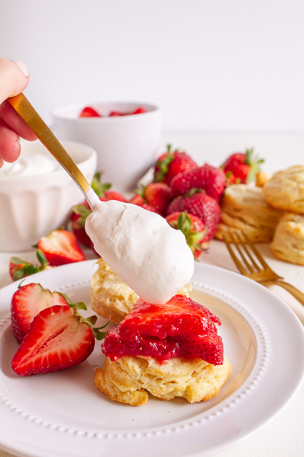 Strawberry Shortcakes topped with fresh strawberries and real whipped cream.