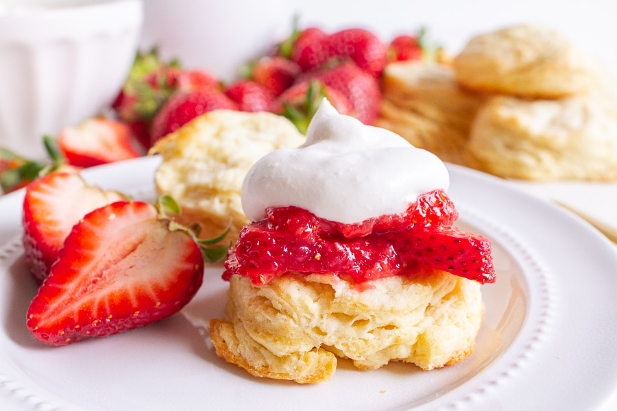 Strawberry Shortcakes topped with fresh strawberries and real whipped cream.