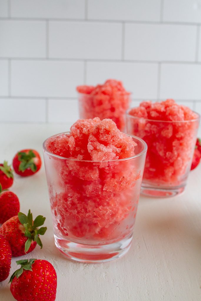 Frozen strawberry slush in a glass.