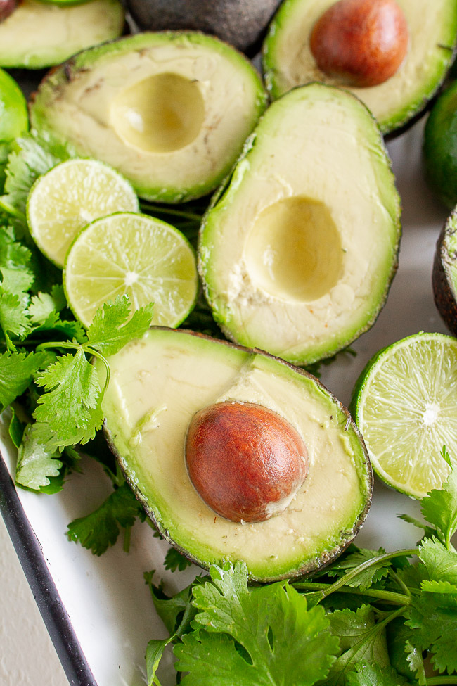 Fresh avocados and cilantro.