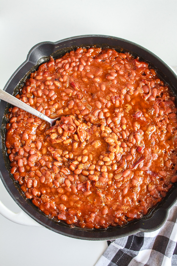 Easy Baked Beans in a black cast iron skillet.