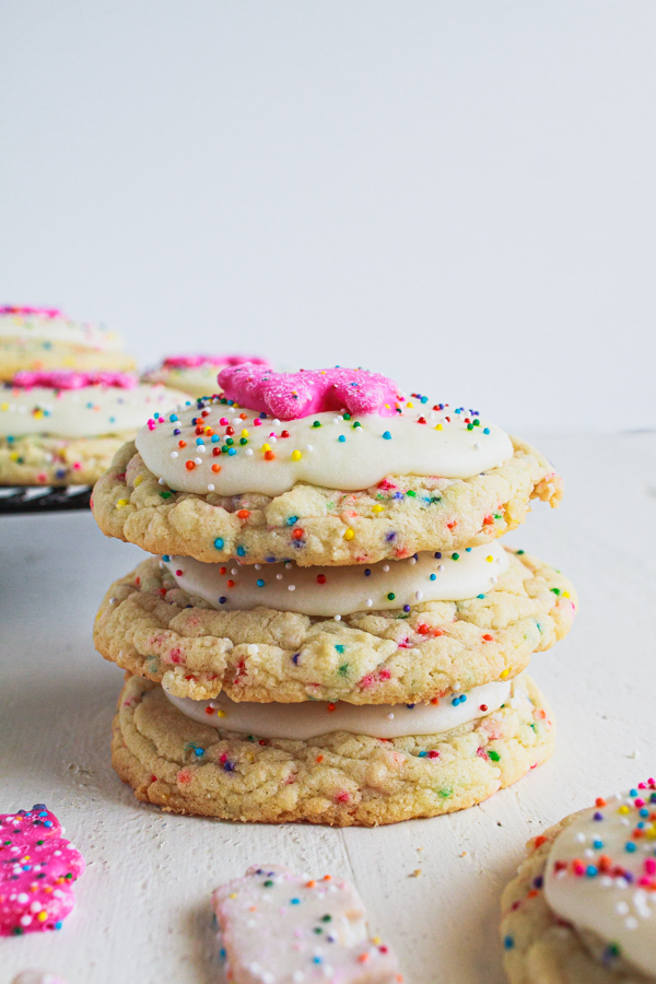 Stacked cookies with sprinkles. 
