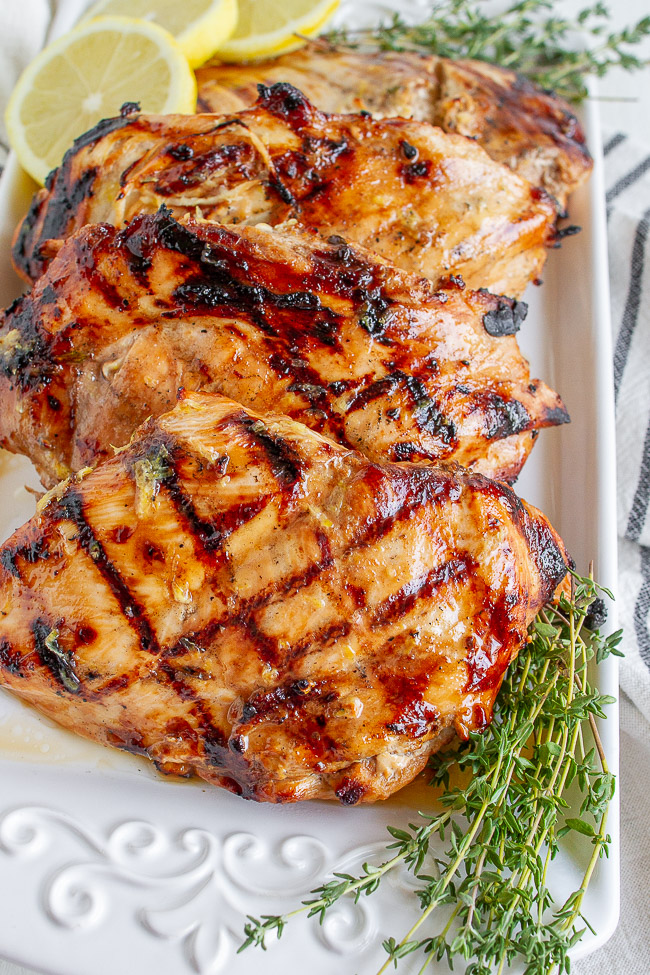 Grilled Lemon Chicken on a white plate.