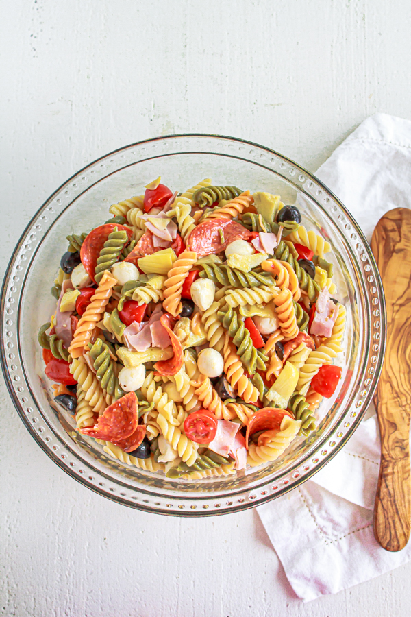 Artichoke Pasta Salad in glass bowl.