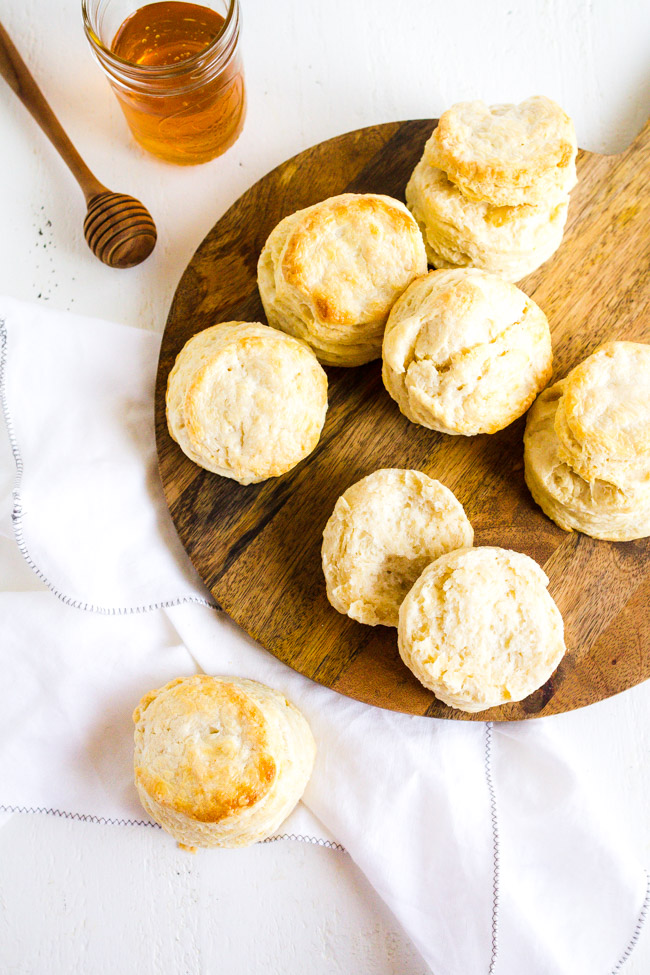 Buttermilk Biscuits on a wooden cutting board.