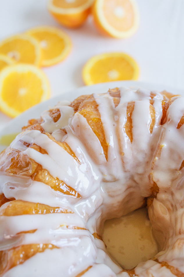 Pull-Apart Bread drizzled with an orange sugar glaze.