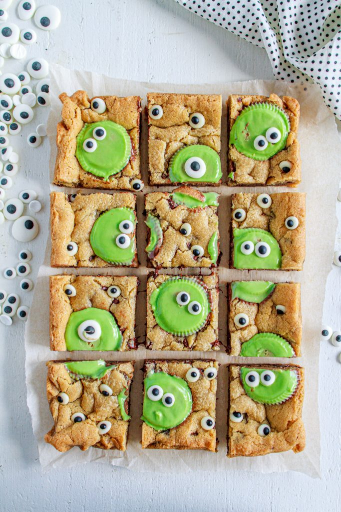 Monster Peanut Butter Cookie Bars cut into squares. 