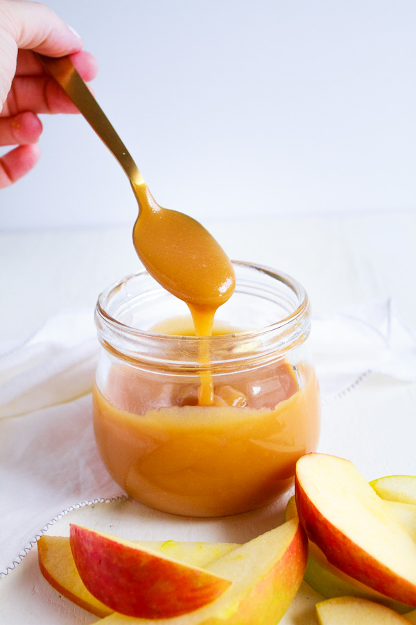 Homemade Caramel Sauce recipe in a glass jar.