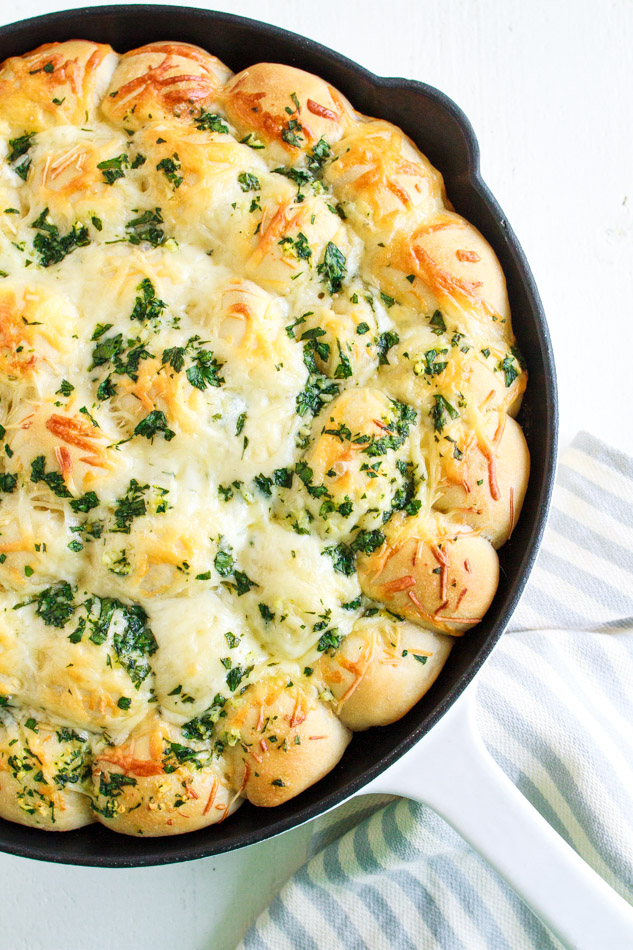 Cheesy Bread in a black cast iron skillet