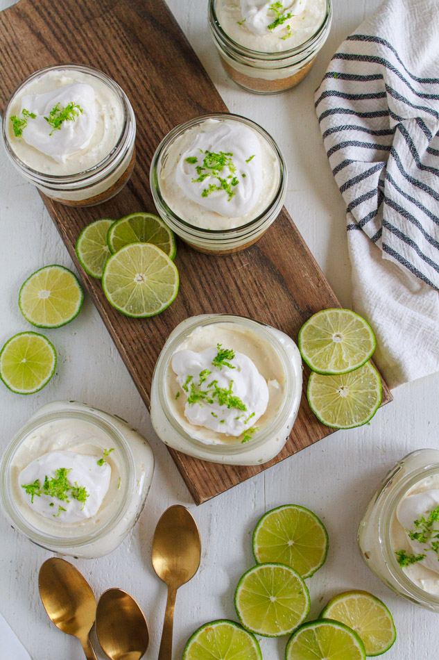 No Bake Mini Key Lime Cheesecakes are not only super creamy, but full of citrus zing.  Made with a simple graham cracker crust and topped with fresh whipped cream and lime zest.  