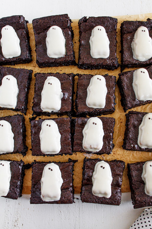 Ghost Brownies are the Halloween Dessert that is a must make this season!  The entire recipe is made in one bowl.  Mostly made with simple pantry ingredients like butter, chocolate chips and eggs.  It also includes black cocoa powder.  This coco powder adds the dark color you need to achieve the blackness that make these a little extra spooky!