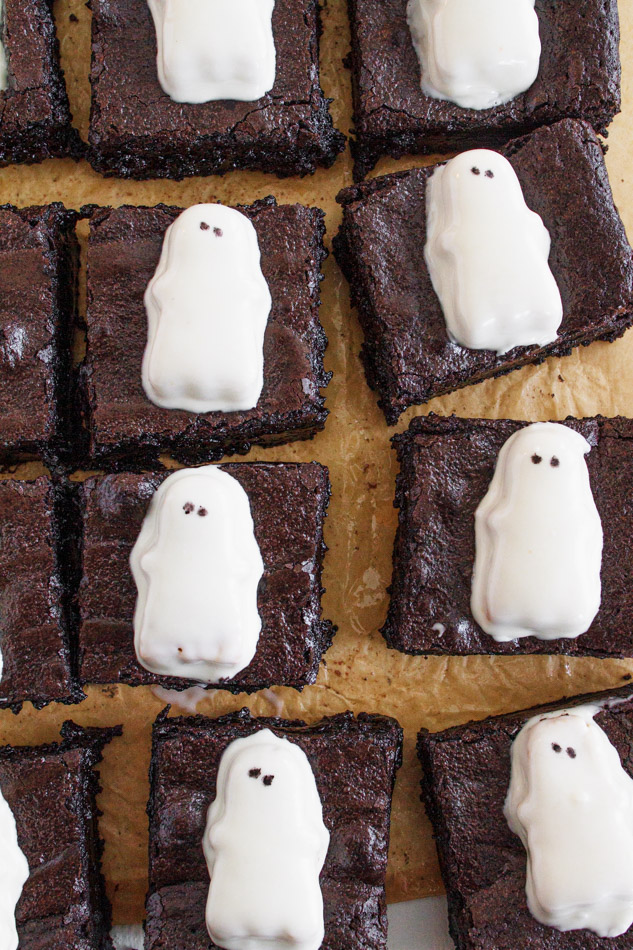 Ghost Brownies are the Halloween Dessert that is a must make this season!  The entire recipe is made in one bowl.  Mostly made with simple pantry ingredients like butter, chocolate chips and eggs.  It also includes black cocoa powder.  This coco powder adds the dark color you need to achieve the blackness that make these a little extra spooky!